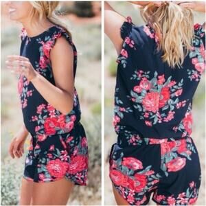 Albion Fit Antigua romper size M floral dark navy background